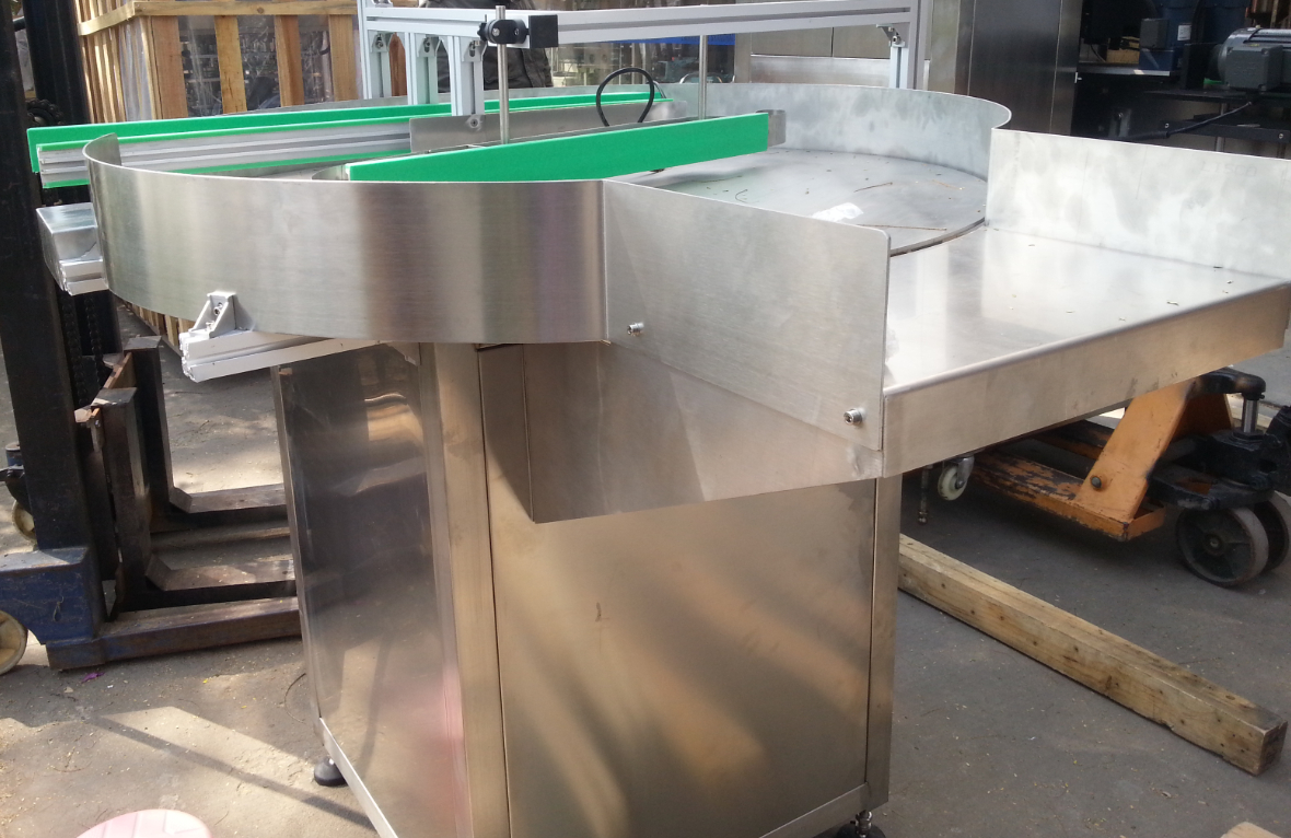 bottle unscrambler machines pullon purkaminen equip.jpg