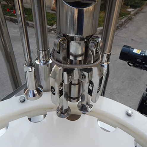 ropp capping heads for vial capper pullot ROPP korkkilaitteet.jpg