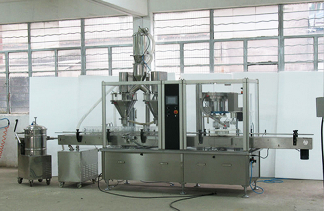 2 heads filling capping machine pharma bottles double heads jauhepakkauskone.jpg
