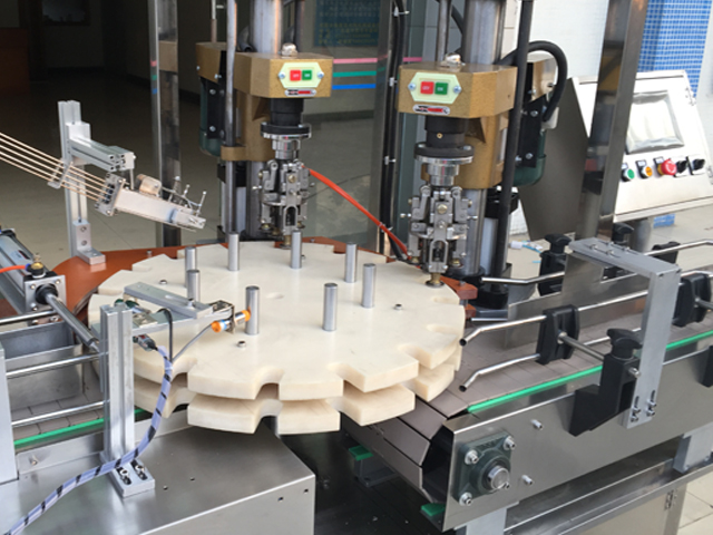 capping head kaksipäinen ruuvikorkki.jpg