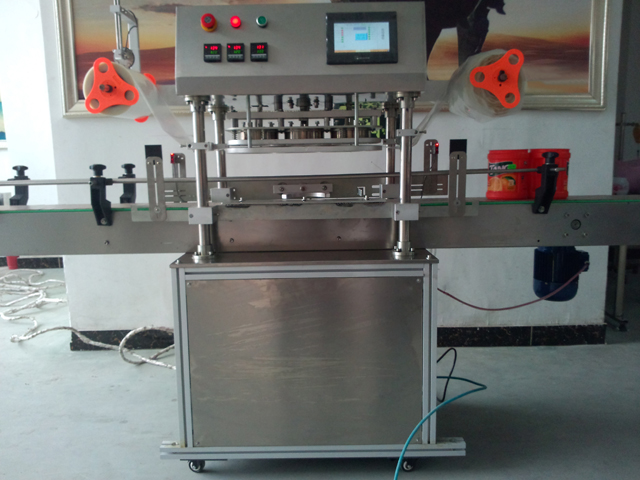 automatic three heads jars sealing equipment purkkien sulkemiskone.jpg