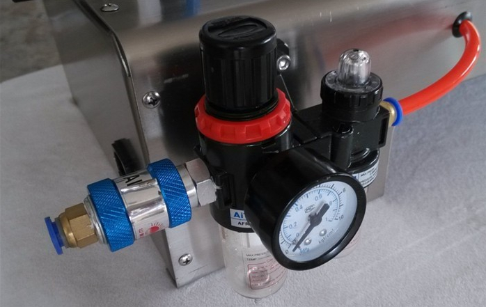 pneumatic liquid lotion filling machine pneumaattinen osa täyttökoneeseen.jpg