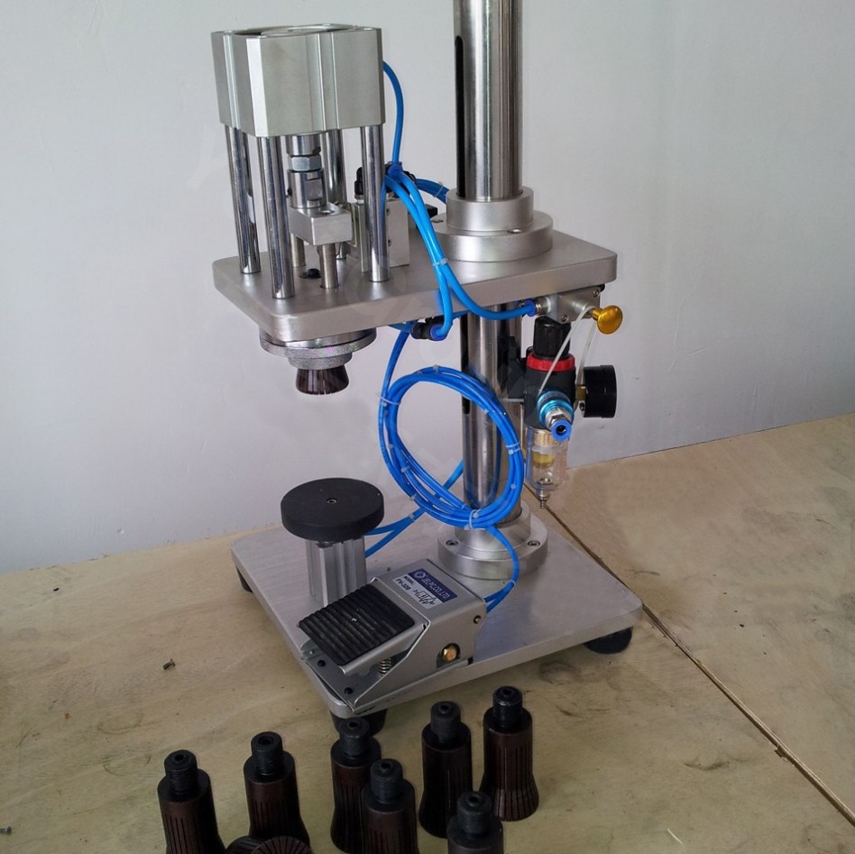 manual crimping machine for glass bottles pneumaattiset sulkulaitteet puoliautomaattiset pneumatic.jpg