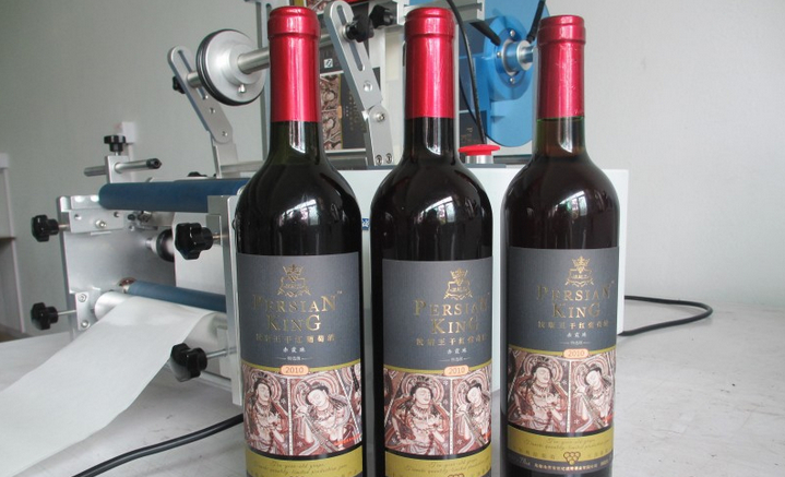 semi automatic labeling machine etiketöintilaitteet.jpg