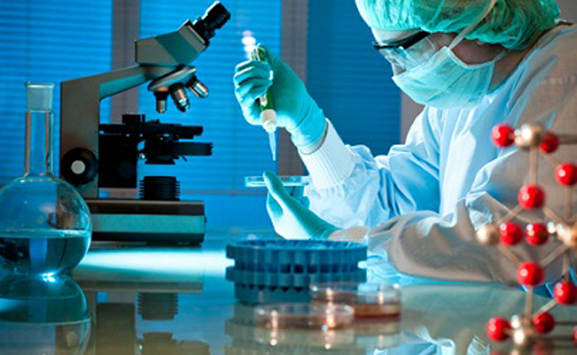 workers testing filling sealing samples laboratoriotesting-with-tubes-filler-sealer.jpg