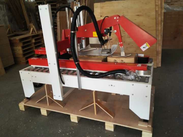 kuumasulateliima kartonkipakkauskone.jpg